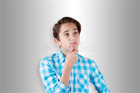 Teenager Being Doubtful Or Thinking About Something Stock Image