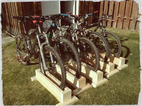 It's basically just a small stand which keeps the front wheel of the bike upright and stable. DIY Bike Rack | DIYIdeaCenter.com