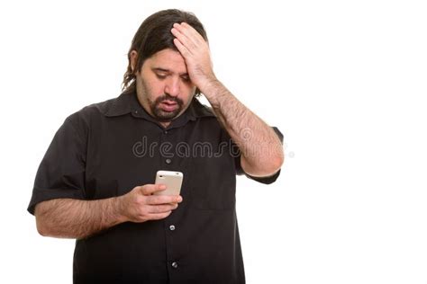 Fat Caucasian Man Looking Tired While Using Mobile Phone Stock Image