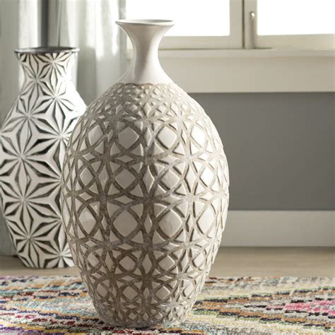 Enjoy free shipping & browse our great selection of floor vases available in many shapes, sizes and finishes! Mistana Tall Ivory Earthenware Floor Vase & Reviews | Wayfair