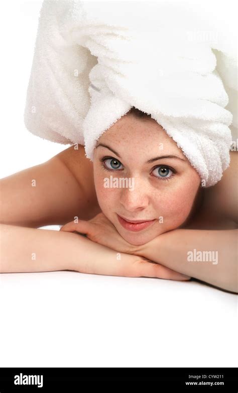 Pretty Girl Laying Down Hair Wrapped In A Towel Spa Theme Stock Photo