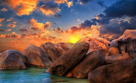 Huge Ocean Rocks At Sunset