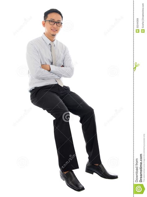 Asian Businessman Sitting On A Transparent Block Stock Image Image Of