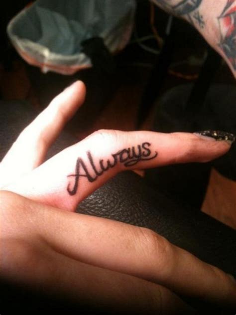 finger tattoos | Popular Tattoo Designs