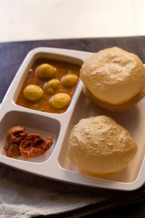 If you keep it soft, your puri may not puff when frying, as well as they will get hard after sometime. poori recipe or puri recipe, how to make pooris | indian ...