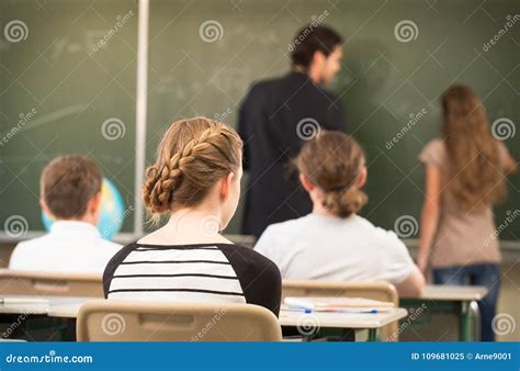 Rteacher Teaching Or Educate At The Board A Class In Schoolr Stock