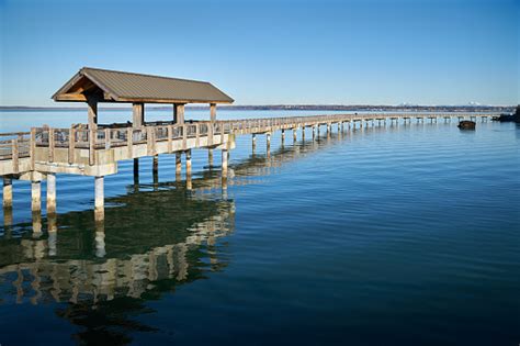 The waters of the pacific offer opportunities for whale watching, cruising to friday harbor or visiting the canadian city of victoria. Boulevard Park Pier Bellingham Washington Stock Photo - Download Image Now - iStock