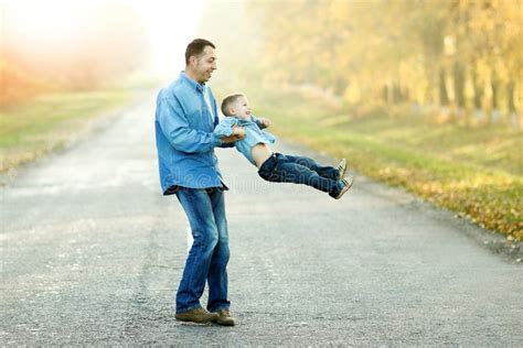 father and son walk and play in nature stock image image of summer fathers 240341541