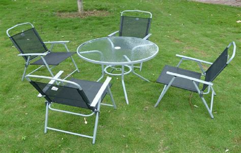 The plastic folding chairs although lightweight are heavy duty, holding up to 650 pounds. IKEA Outdoor Dining Set Glass Top Table With Folding ...