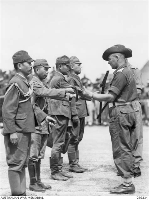 Cape Wom New Guinea Japanese Officers Hand Their Swords To Australian