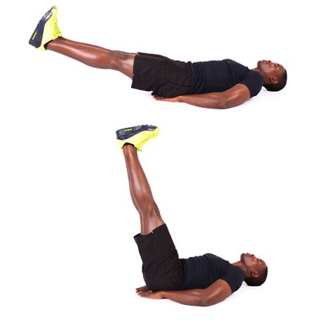 Man Demonstrates How To Perform Lying Leg Raises Ab Exercise