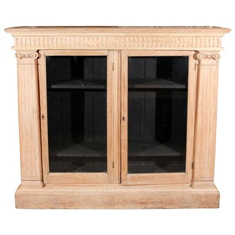 Ornately Carved Oak Bookcase With Leaded Glass Doors At 1stdibs