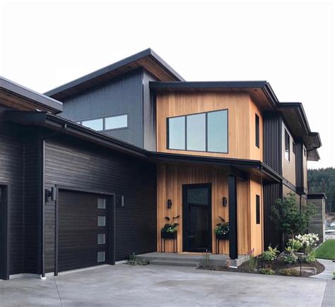 Gorgeous Black House Exterior With Natural Wood Accents And Black