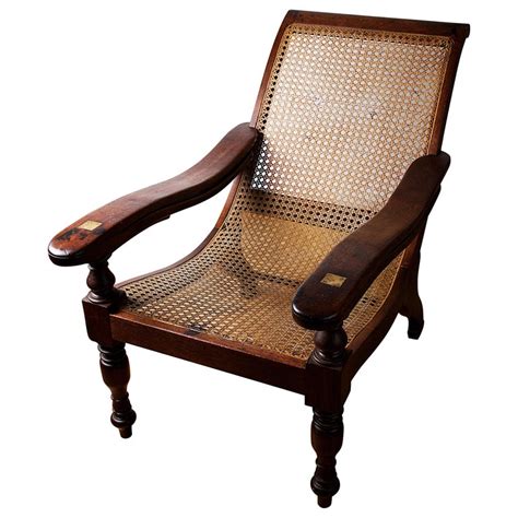 Special price £129.99 regular price £189.99. Victorian Teak and Rattan Plantation Steamer Chair at 1stdibs
