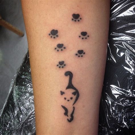 15 Best Cat Paw Print Tattoo Designs
