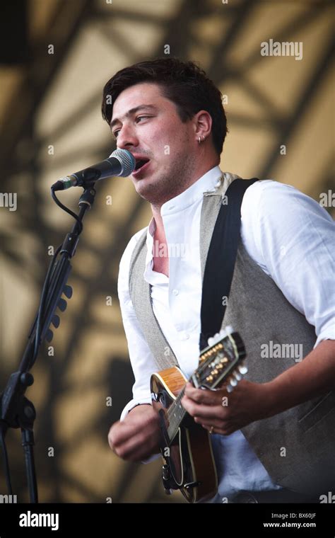 Marcus Mumford Of The Band Mumford And Sons Plays Guitar And Sings Vocals