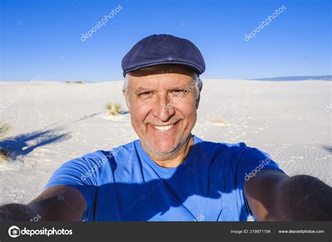 Handsome Man In The Desert Stock Photo By ©fotoluminate 319971194