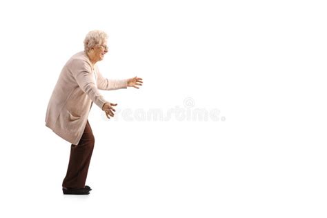 full length profile shot of an elderly woman waiting with arms wide open stock image image of