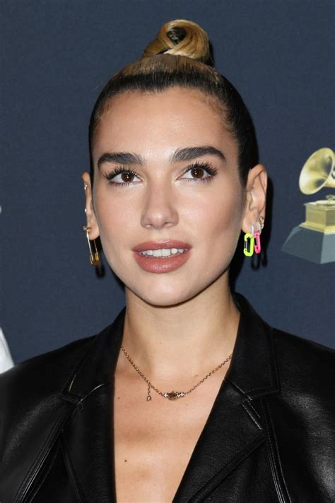 Her musical career began at age 14, when she began covering songs by other artists on youtube. Dua Lipa At Pre-GRAMMY Gala & GRAMMY Salute to Industry Icons in Beverly Hills - Celebzz - Celebzz