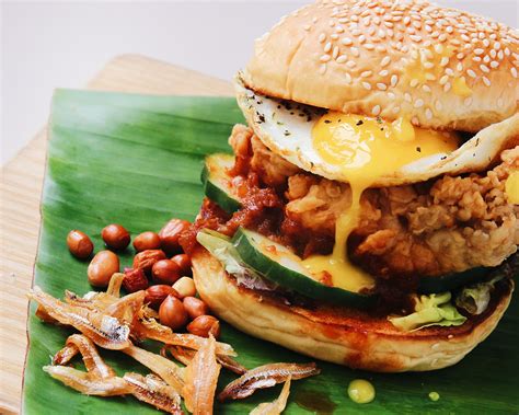 The nasi lemak burger with otah rice patties is proudly and specially created for singapore. Here's a Nasi Lemak Burger That's Not by McDonald's ...