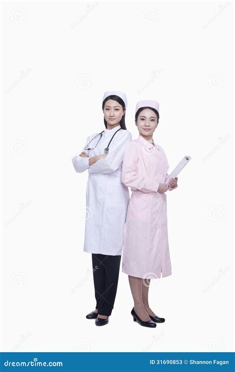 Portrait Of Two Young Nurses Studio Shot Stock Image Image Of