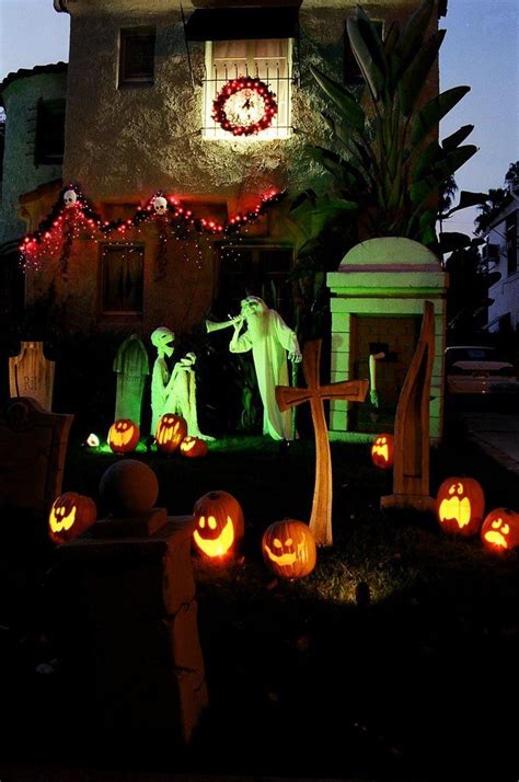 New orleans is known for its haunted history. Haunted Mansion inspired Halloween yard display ...