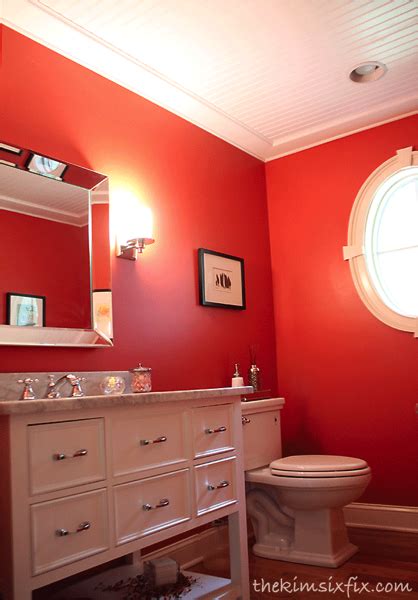 Measure the ceiling and locate the ceiling joists. red-bathroom-with-beadboard-ceiling.png