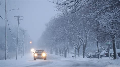 Snowstorm Causes Statewide School Closings And Slippery Roads