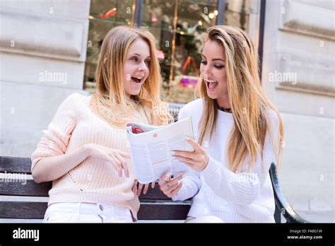 Two Young Girls Sitting Together Hi Res Stock Photography And Images