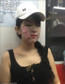 girls in beijing pictured on a busy train with condoms on their faces daily mail online