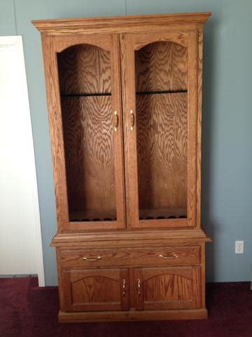 Gun concealment cabinet in wood and brushed silver metal with custom name or logo terratimbertreasures 5 out of 5 stars (345) $ 60.00. Solid Wood 10-Gun Cabinet - Nex-Tech Classifieds