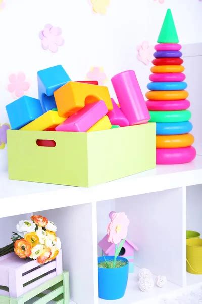 Colorful Plastic Toys In Children Room Stock Photo By ©belchonock 47347353