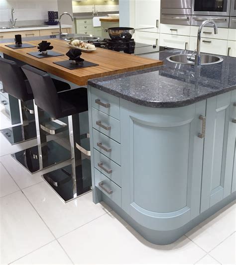 Contemporary Kitchen Island Design In Blue With Curved Units Inset
