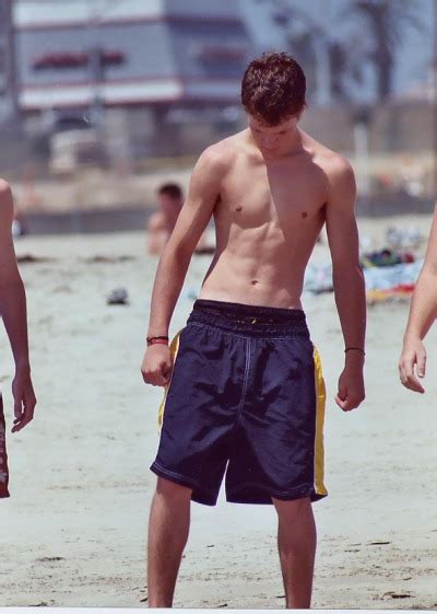 Shirtless Boy On The Beach Tumbex
