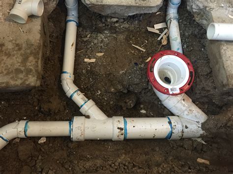 Trenching out a line to the drain. Project: Bathroom Rough-In | Alliance Drain & Plumbing LLC