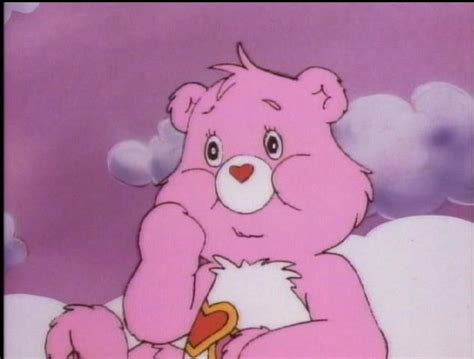 A Pink Teddy Bear Sitting On Top Of A Cloud Filled Sky