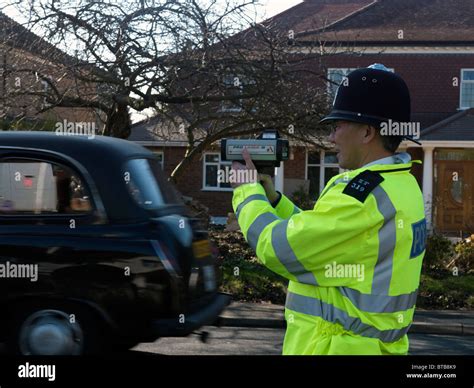 Policeman Using Speed Radar Gun Hi Res Stock Photography And Images Alamy