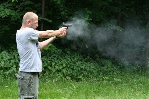 Man Shooting A Gun Free Photo Download Freeimages