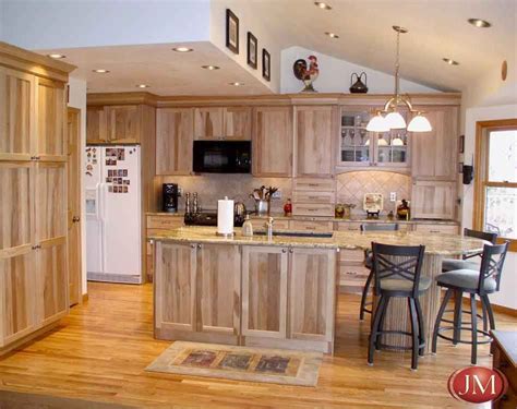 Bored with your current kitchen and wondering how to spruce it up? Custom kitchen natural pecan wood cabinets, hardwood ...