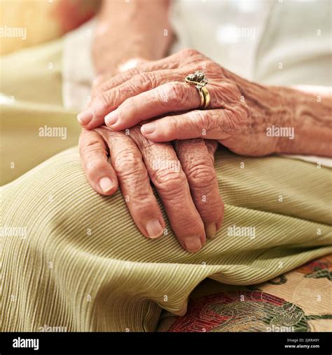 The Passing Of Time Can Be Seen In The Hands An Elderly Womans Hands
