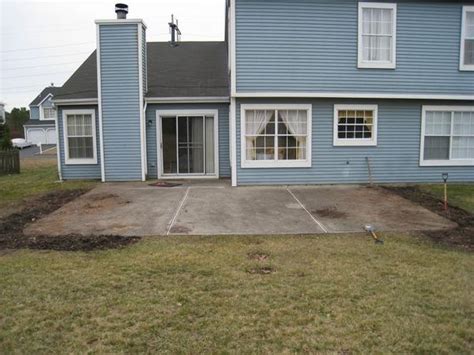 The next step involves adding pavers on top of the sand. Paver Over Concrete Patio - Ceramic Tile Advice Forums ...