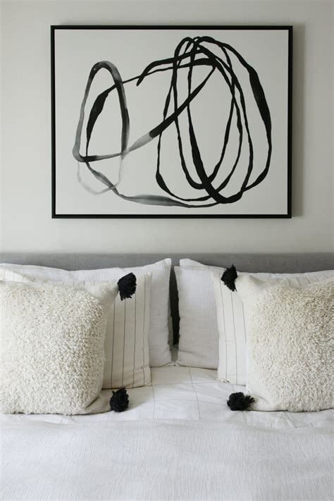Displaying wall art is a great way to have your home reflect your personality and taste. New Abstract Art In the Bedroom - Chris Loves Julia