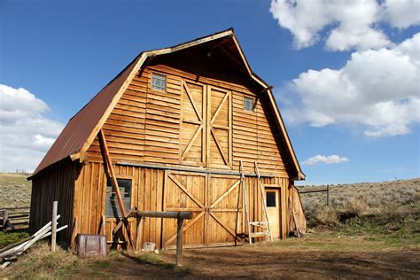 Pole barns have poles buried in the ground; Hoop Buildings vs. Pole Barns | Accu-Steel Fabric Covered ...