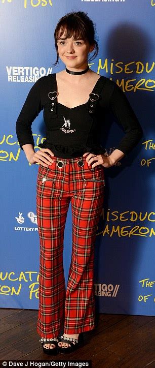 Maisie Williams Channels 90s Grunge In Plaid Trousers And A Choker