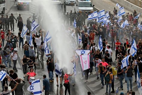 Bangkok Post Israel S Netanyahu Vows Unity As Thousands Decry Justice