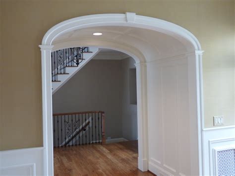Barrel Ceiling In Entry Way Capped On Each End By Arched Doorways