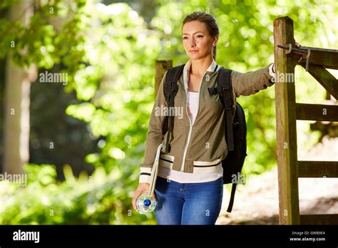 Woman Walking In Countryside Stock Photo Alamy