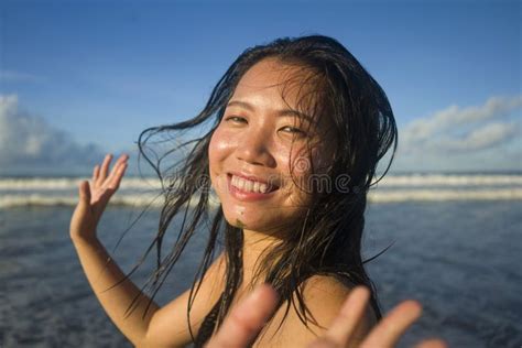 Natural Lifestyle Portrait Of Young Attractive And Happy Asian Chinese