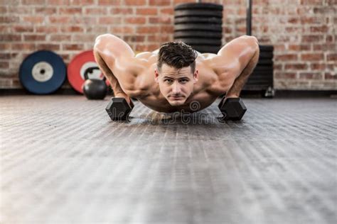 Portrait Of Man Doing Dumbbell Push Ups Stock Photo Image Of Fitness
