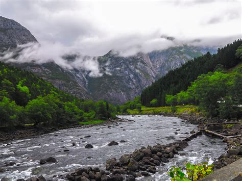 Calm River Near Mountains · Free Stock Photo